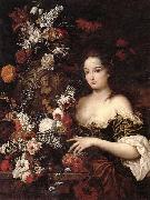 Gaspar Peeter Verbrugghen the younger, A still life of various flowers with a young lady beside an urn